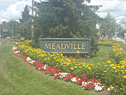 Welcome sign into  Meadville along Rt. 322
